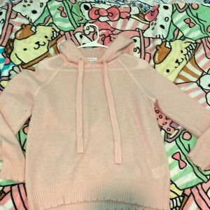 A pink hoodie (designer)